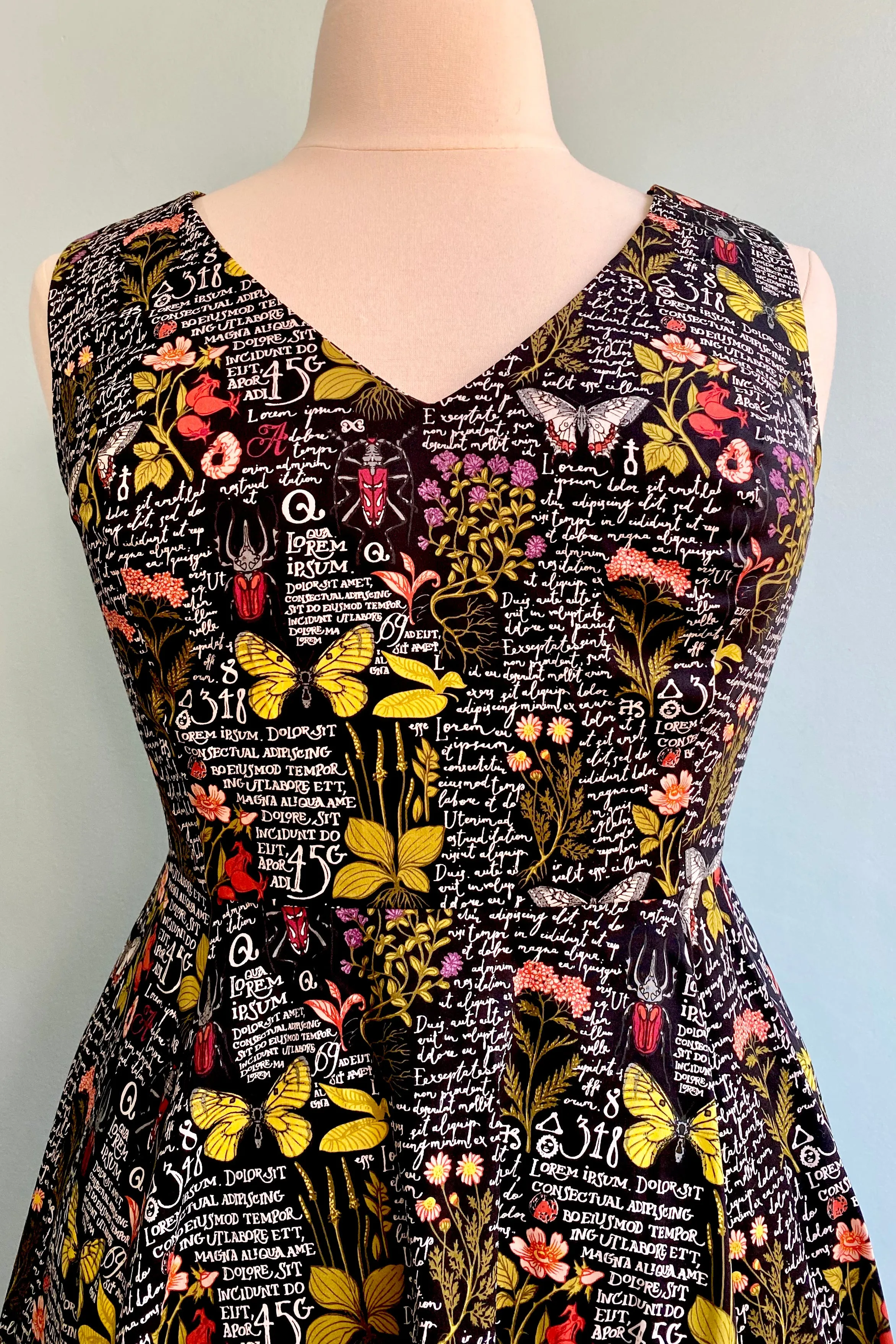 Butterfly and Bug Botanical V-Neck Dress by Eva Rose